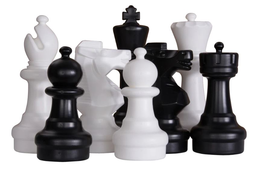 Giant black and white chess pieces.