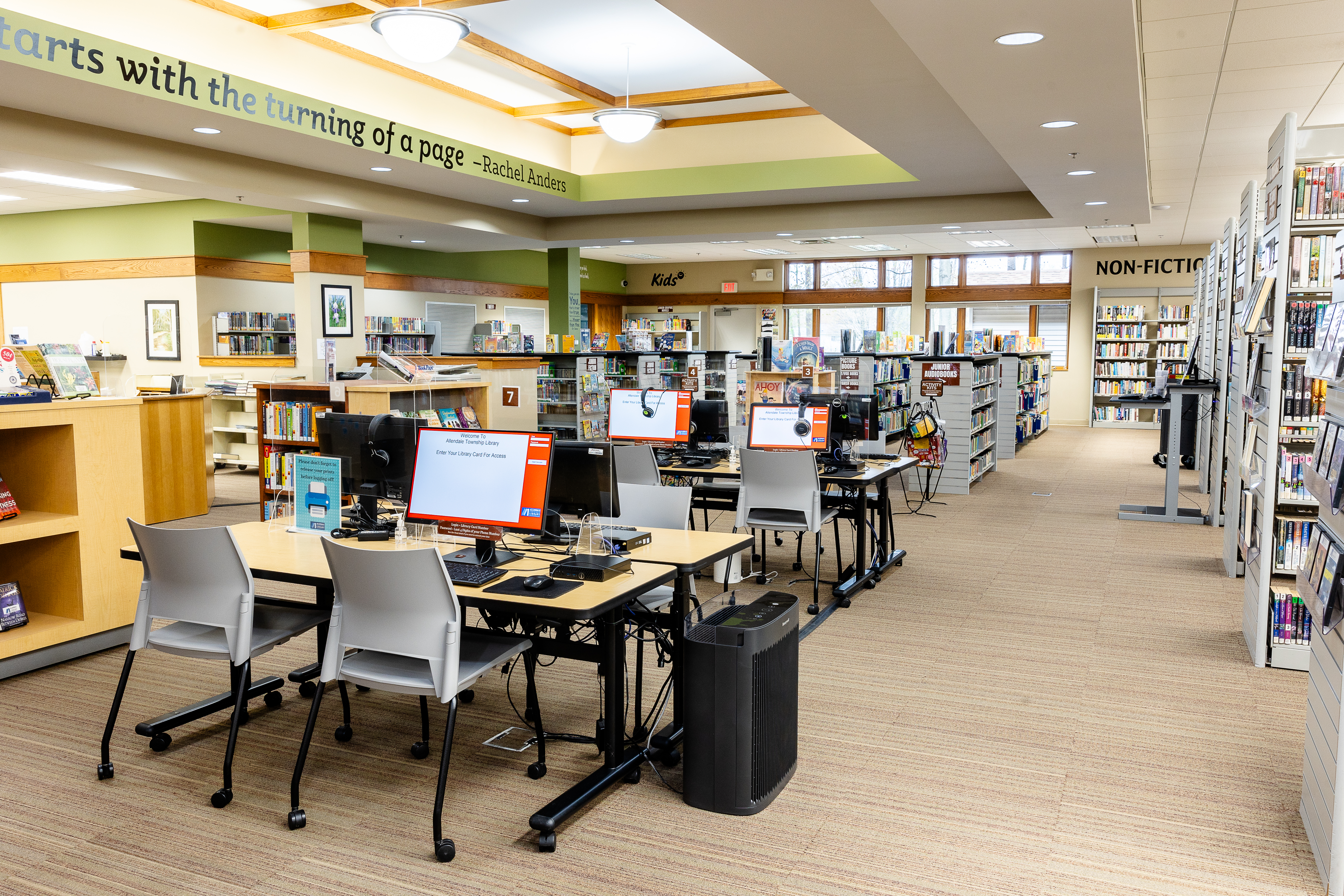 Public computers with desks and desk chairs.